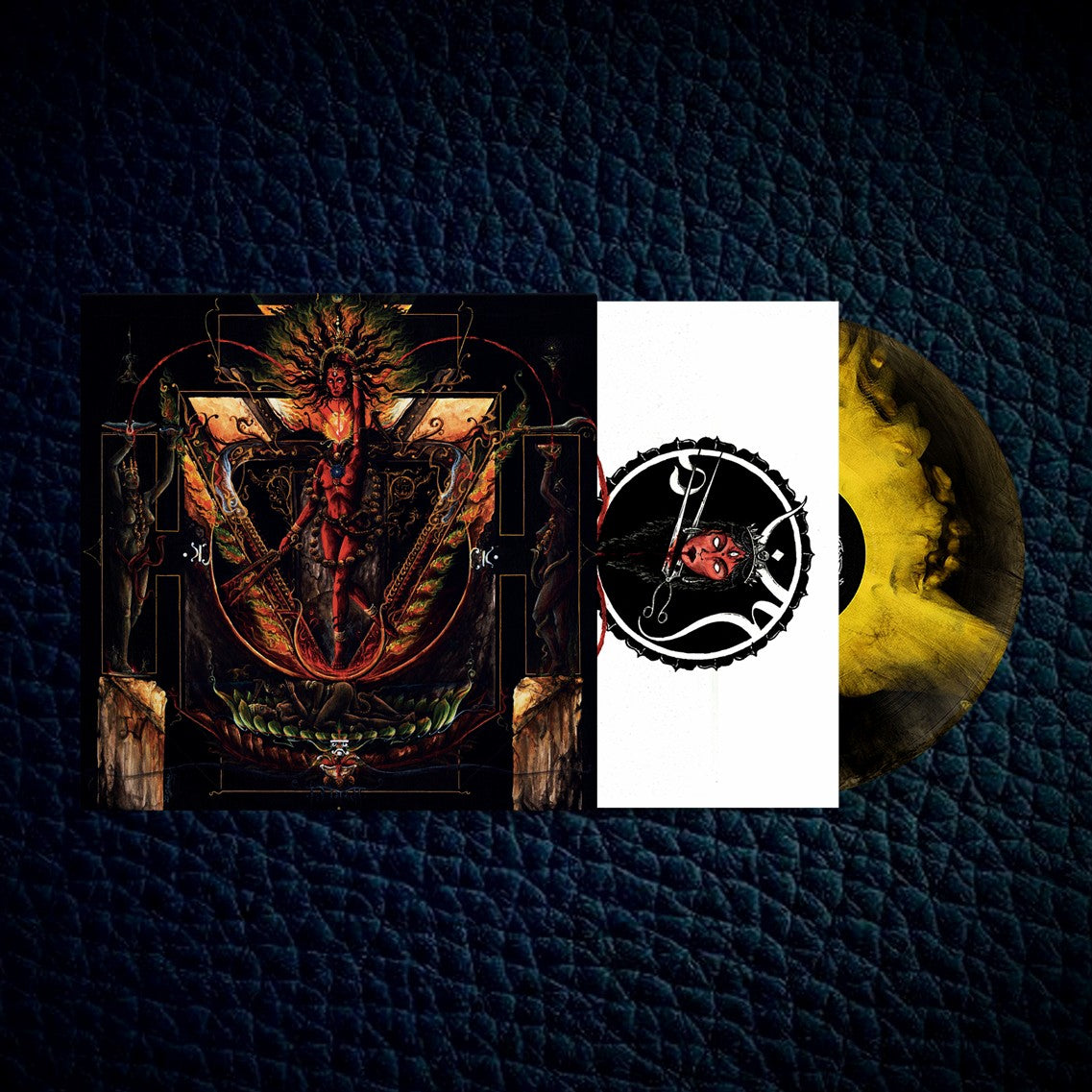 Vinyl record with cover featuring artistic design on a textured dark surface